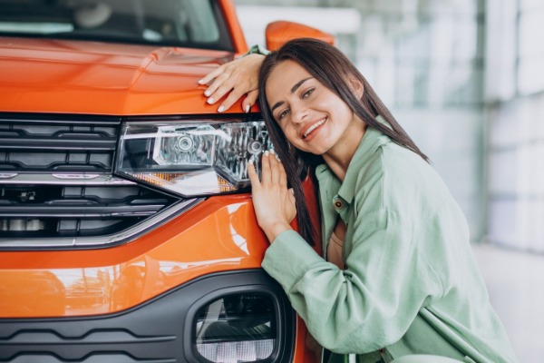 Woman with her car insured