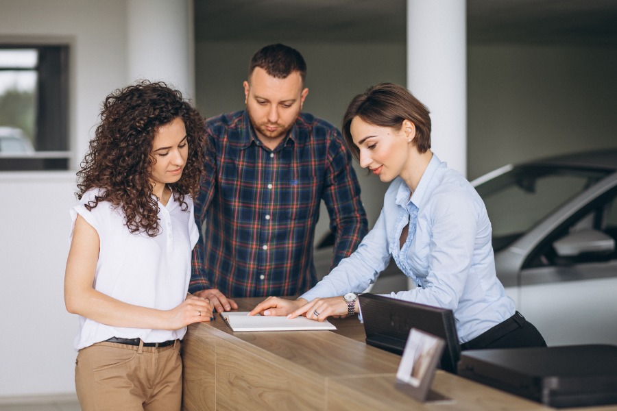 A couple exploring various insurance products